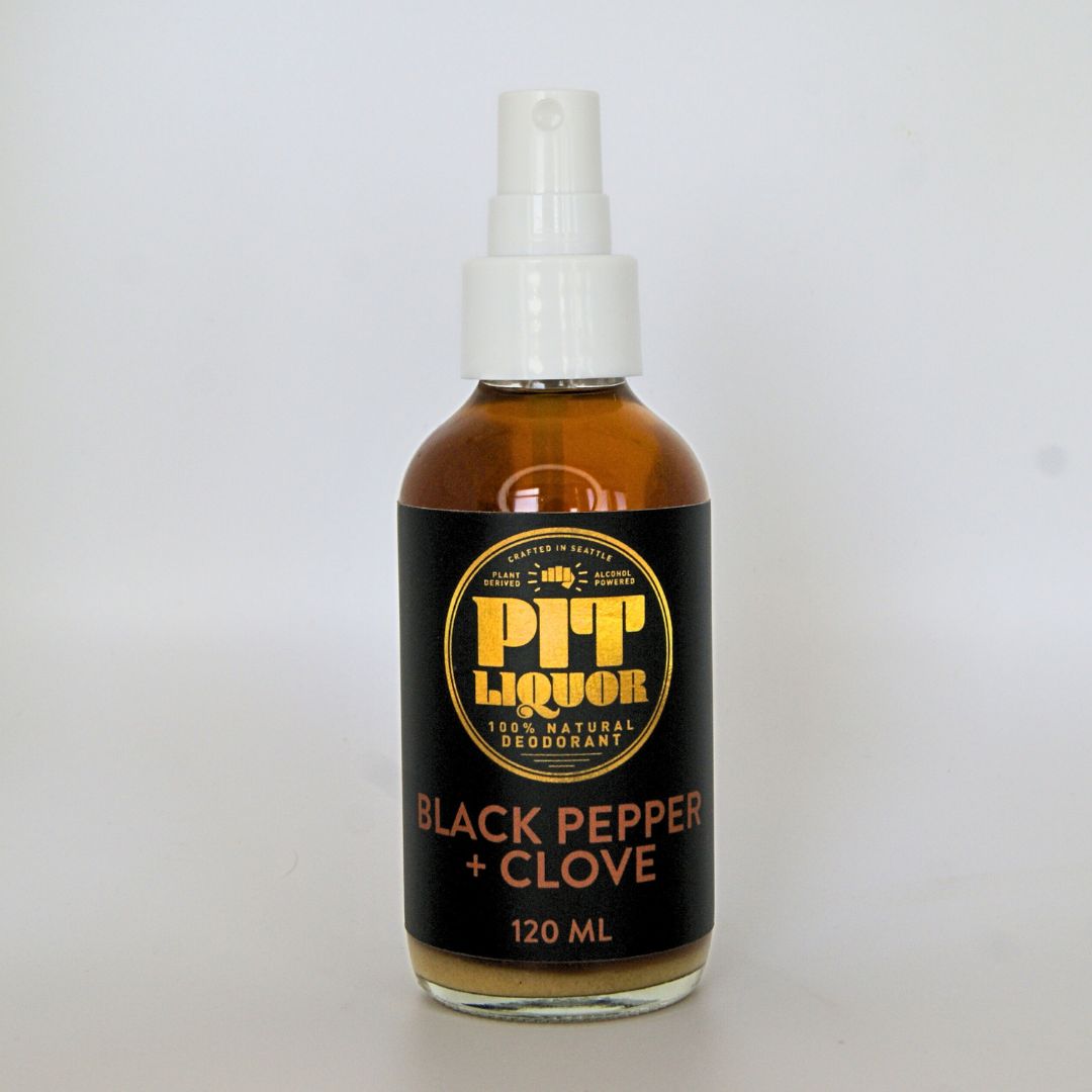 Bottle of Pit Liquor Black Pepper + Clove deodorant on a white background